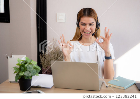 Professional young business woman working and meeting online in modern home office. 125382241