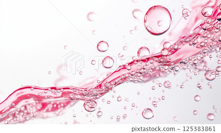 Dynamic pink liquid and bubbles in motion on white background Dynamic pink liquid and bubbles in motion on white background 125383861