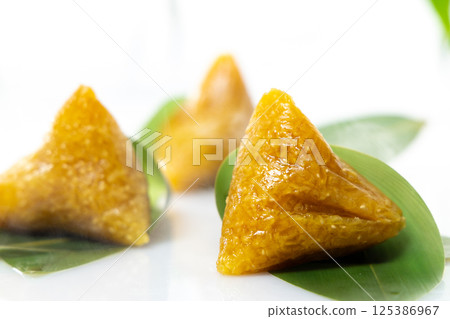 alkali rice dumpling, china, dragon boat festival, bamboo leaves, glutinous rice 125386967