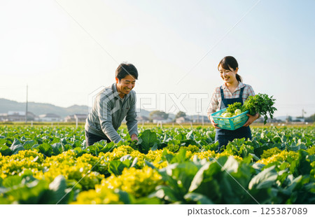 A happy couple who enjoy farming 125387089