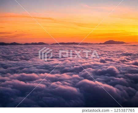 Sea of clouds at sunrise (AI generated image) 125387765