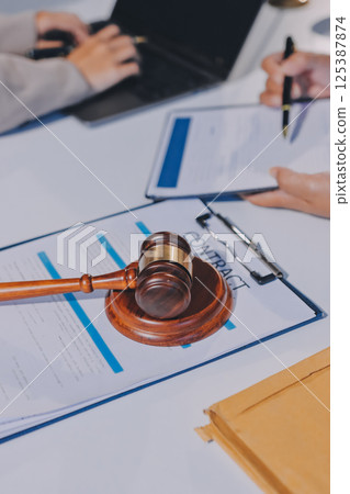 Concept of legal counseling. The lawyer or legal counsel is listening and providing advice to business people. 125387874