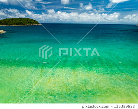 Aerial view beautiful sea surface nature background,Amazing waves texture ocean with clouds 125389658