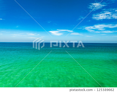 Aerial view beautiful sea surface nature background,Amazing waves texture ocean with clouds 125389662
