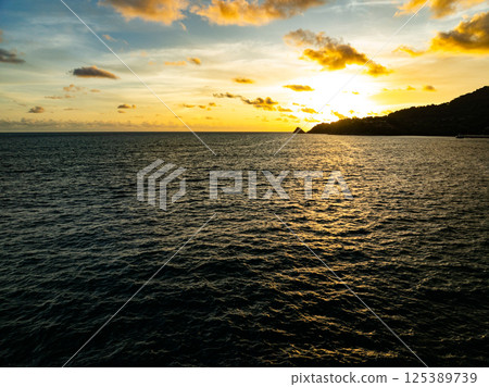 Aerial view beautiful sea surface nature background,Amazing waves texture ocean with clouds 125389739