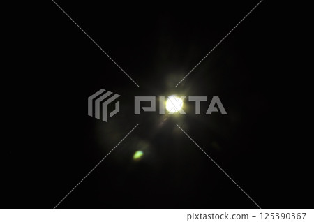 Sun flare on the black background Sun flare on the black background 125390367