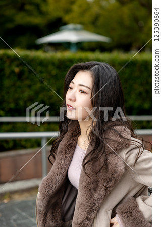A woman staring blankly 125390864