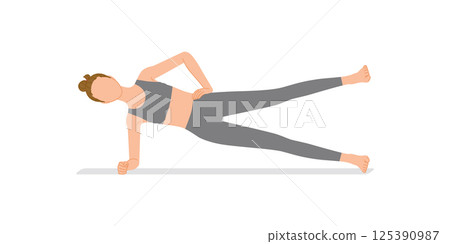 Strength training: Young woman doing a plank (correct form side plank leg lift) 125390987