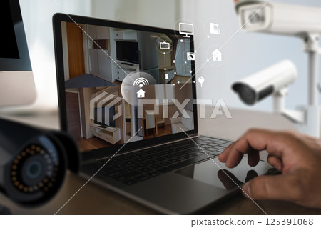 cctv security system man monitoring at office from smart phone Camera Footage On Screen cctv security system man monitoring at office from smart phone Camera Footage On Screen 125391068