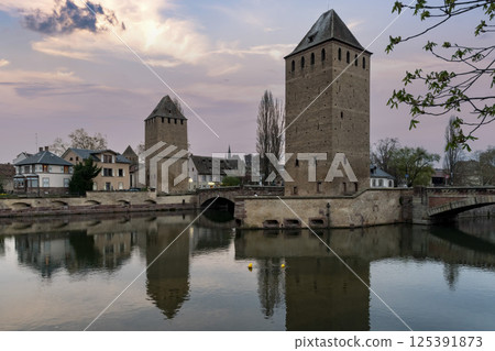 Strasbourg reflected in the River Ill at dusk in Alsace, France 125391873