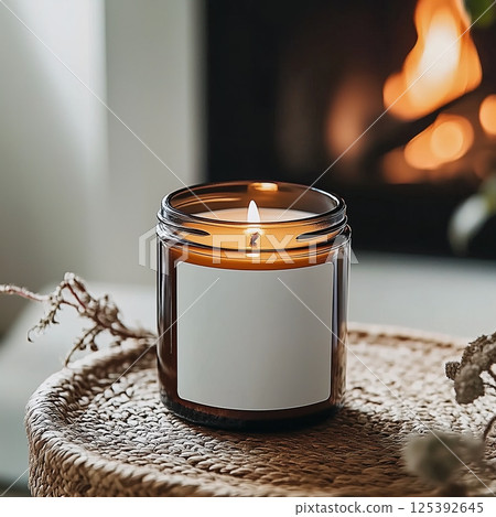 Amber glass candle in country house home interior, candle jar label mockup, cozy lifestyle candle branding template 125392645