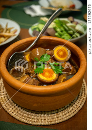 Braised eggs with pork belly Braised eggs with pork belly 125392676