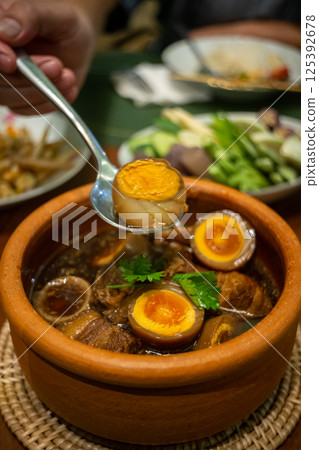 Braised eggs with pork belly Braised eggs with pork belly 125392678