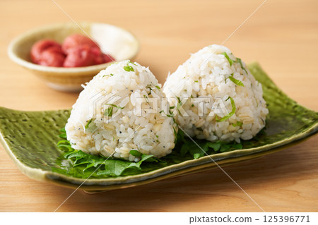 Mochi barley, green shiso and whitebait rice balls 125396771