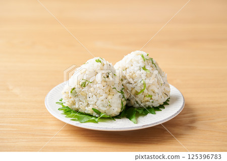 Mochi barley, green shiso and whitebait rice balls 125396783