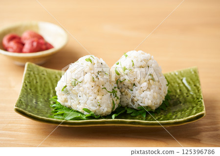 Mochi barley, green shiso and whitebait rice balls Mochi barley, green shiso and whitebait rice balls 125396786