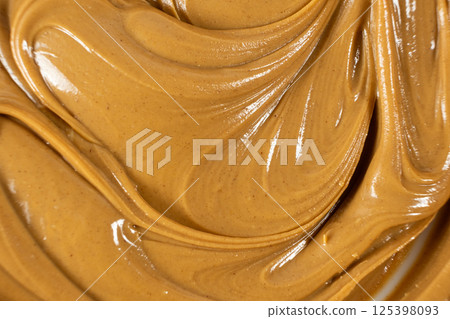 Abstract Close-Up of Peanut Butter Texture 125398093