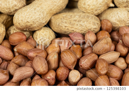 Shelled and Unshelled Peanuts Close-Up 125398103