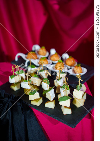 Cheese and pear canapes. A delicious appetizer for a banquet. 125398275