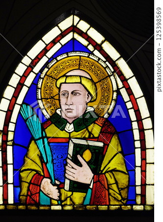 Saint Deacon the Martyr depicted in the stained-glass window designed by Italian Renaissance painter Giotto di Bondone dated from the early 14th century in the Basilica di Santa Croce in Florence Saint Deacon the Martyr depicted in the stained-glass window designed by Italian Renaissance painter Giotto di Bondone dated from the early 14th century in the Basilica di Santa Croce in Florence 125398569