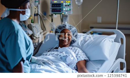 The doctor cheerfully communicates with the patient in the recovery room. Amidst the recovery process, the doctor's cheerful presence brings a sense of ease and encouragement. A healing touch! 125398741