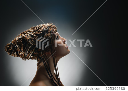 girl with an african plaits girl with an african plaits 125399380