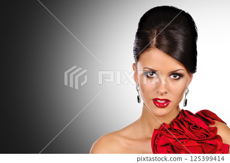 Female in luxurious jewelry 125399414