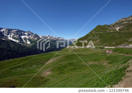 The St. Gotthard Pass, which has been built starting 1827, connects the two Swiss cantons Uri and Ticino, Switzerland The St. Gotthard Pass, which has been built starting 1827, connects the two Swiss cantons Uri and Ticino, Switzerland 125399746