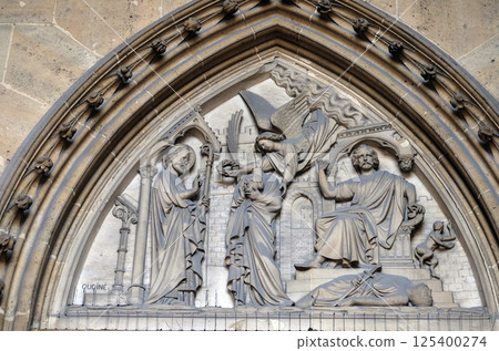 Bass relief on the portal of the Basilica of Saint Clotilde in Paris, France 125400274