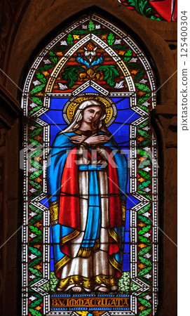 Immaculate Conception, stained glass window in the Basilica di Santa Croce (Basilica of the Holy Cross) - famous Franciscan church in Florence, Italy Immaculate Conception, stained glass window in the Basilica di Santa Croce (Basilica of the Holy Cross) - famous Franciscan church in Florence, Italy 125400304