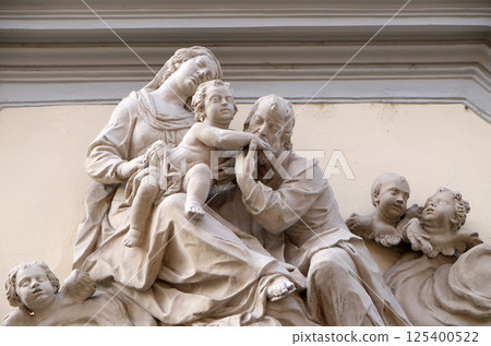 Holy Family, statue on the house facade in Graz, Styria, Austria 125400522