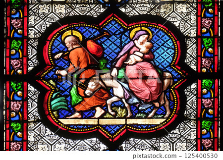 Flight to Egypt, stained glass window in the Basilica of Saint Clotilde in Paris, France Flight to Egypt, stained glass window in the Basilica of Saint Clotilde in Paris, France 125400530