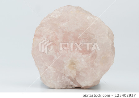 Pink raw crystal stone 125402937