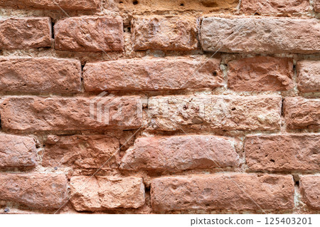 Close Up of Weathered Red Brick Wall 125403201