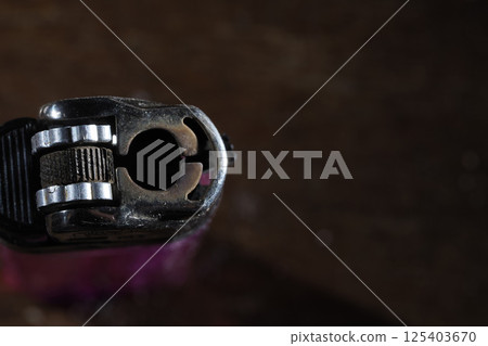 old used hand cigarette lighter old used hand cigarette lighter 125403670
