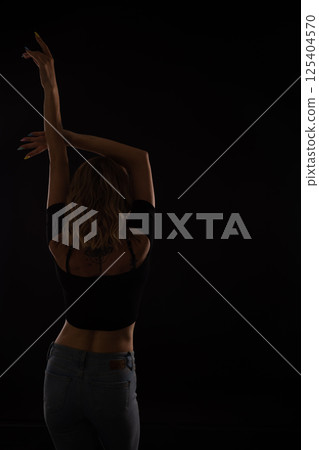 blonde woman dancing alone to music blonde woman dancing alone to music 125404570