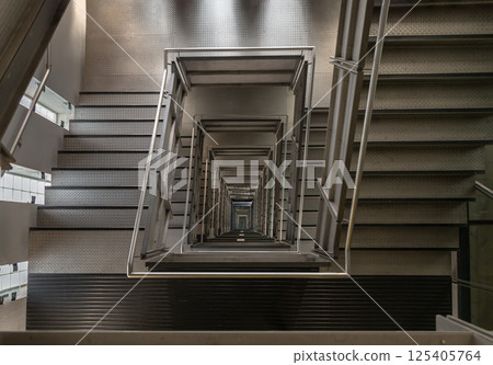 Looking down into the Square shaped Spiral staircase inside of Centre for Contemporary art. Looking down into the Square shaped Spiral staircase inside of Centre for Contemporary art. 125405764