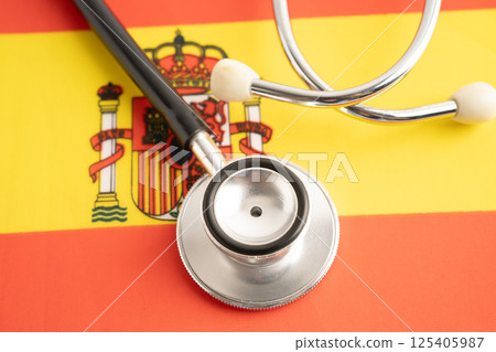 Stethoscope on Spain flag, business and finance. 125405987