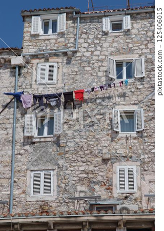 Traditional Stone Facade and Clothesline in Dubrovnik 125406015