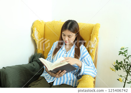 Reading Book at Home 125406742