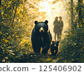 A mother and child Asiatic black bear seen off by a person_Coexistence of humans and bears in nature 125406902