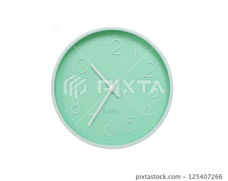 Modern mint green wall clock with white frame and numbers, showing 10:35 or 22:35. Ideal for minimalist designs, time-related content, or morning routine visuals. 125407266