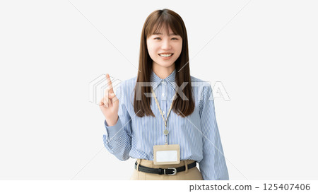 A smiling woman/businesswoman pointing with her index finger up 125407406