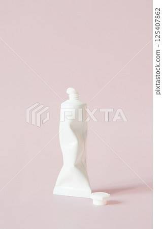 White Crumpled Tube Packaging for Cream or Toothpaste. Beauty Product Mockup with Lid Off. 125407862