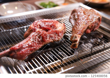 Chinese food. Grilled lamb ribs. 125408056