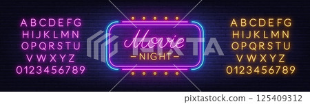 Movie Night Neon Sign on brick wall background. Light text announcement. Pink and yellow neon alphabet. 125409312