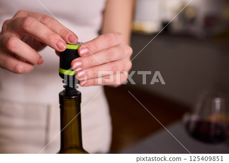 Experience the art of elegant wine pouring using the most modern and innovative tools available Experience the art of elegant wine pouring using the most modern and innovative tools available 125409851