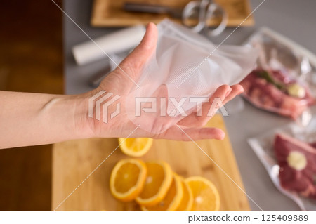 Efficiently Vacuum Sealing Fresh Citrus Fruits for Maximum Storage Time and Flavor Preservation Efficiently Vacuum Sealing Fresh Citrus Fruits for Maximum Storage Time and Flavor Preservation 125409889