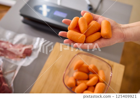 Preparing Healthy Meals Focus on Carrots and the Benefits of Vacuum Sealing Techniques Preparing Healthy Meals Focus on Carrots and the Benefits of Vacuum Sealing Techniques 125409921