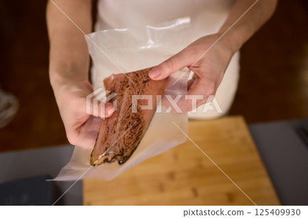 Sous Vide Cooking Utilizing Vacuum Sealing Techniques for the Storage of Fresh Meats 125409930